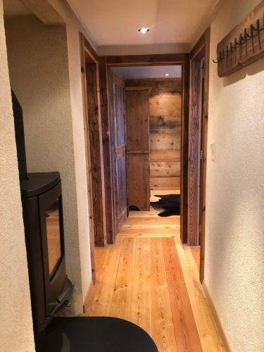 Alpine Ski Chalet – FF&E rustic living room with designer textures